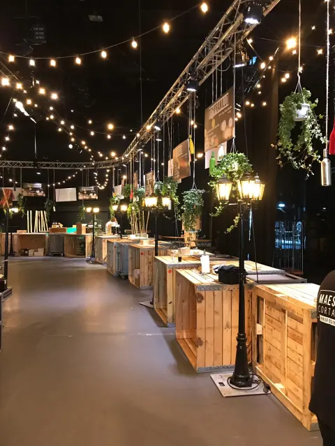 Market stalls with lamps and plants