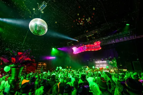 Dance floor with a disco ball and green light
